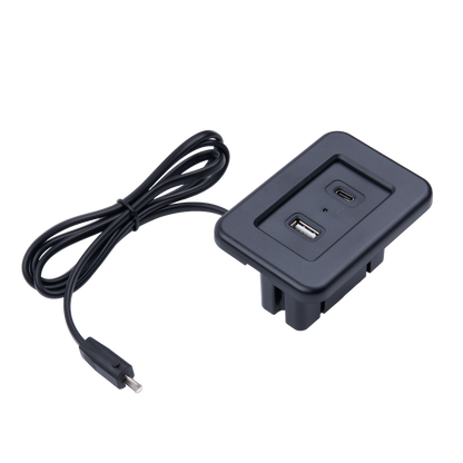 A black USB-C to USB-A adapter dongle with a coiled cable, shown on a solid white background.
