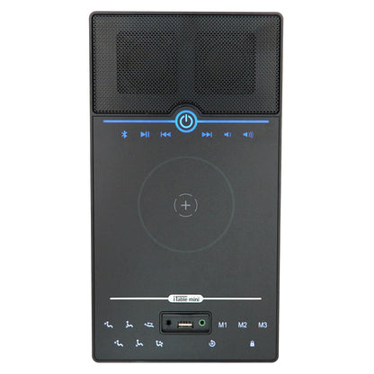 A black portable Bluetooth speaker with an integrated wireless charging pad and control buttons on the front, shown against a plain white background.
