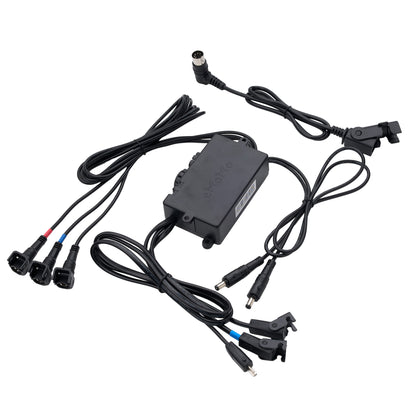 Black electronic controller module with attached wiring harnesses and multiple connector plugs, photographed on a plain white background.