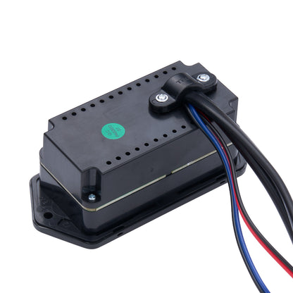 Black electronic module with wires on a white background