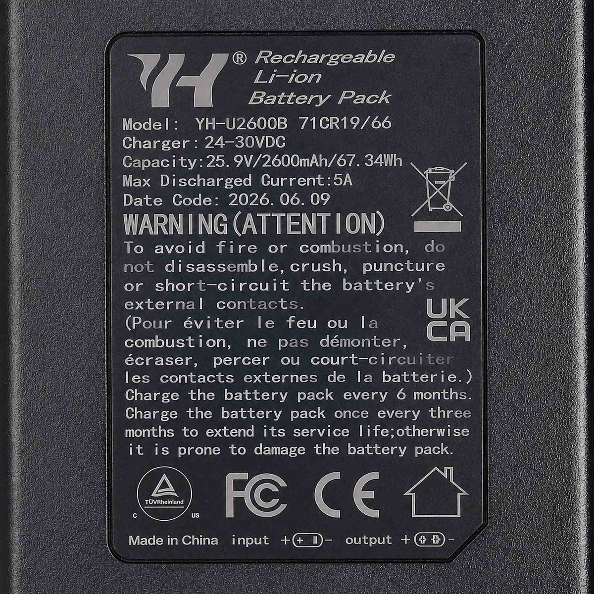 Spec label on the 2600mAh recliner battery pack showing 25.9V, 67.34Wh, 5A max discharge and charging instructions