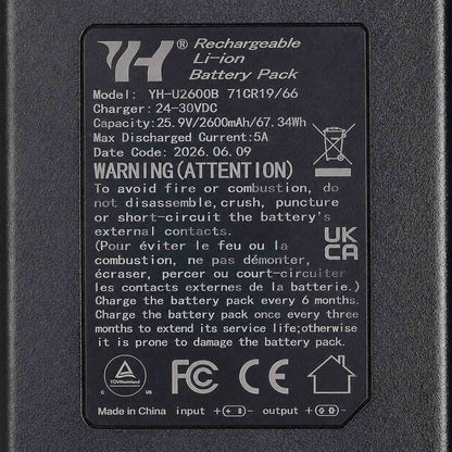 Spec label on the 2600mAh recliner battery pack showing 25.9V, 67.34Wh, 5A max discharge and charging instructions